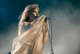 Riley Keough as Daisy Jones in Daisy Jones & The Six, performing in a style reminiscent of Stevie Nicks (Credit: Lacey Terrell/Prime Video)