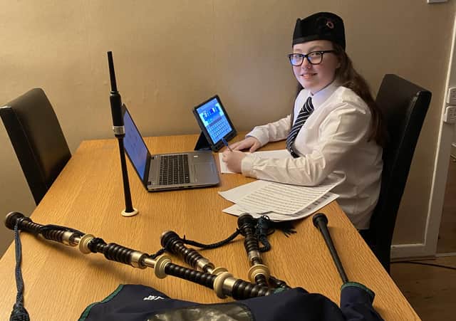 Wake Up Scotland....offers young musicians, like Caitlin Mackay pictured here playing with friends and composing via Zoom, a chance to play with Red Hot Chilli Pipers.