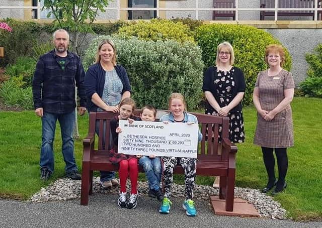 Megan and her family presented the proceeds of the virtual raffle to the staff at Bethesda care home and hospice this morning (Friday).