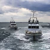 Four Archer Class P2000 Patrol Boats together at sea.