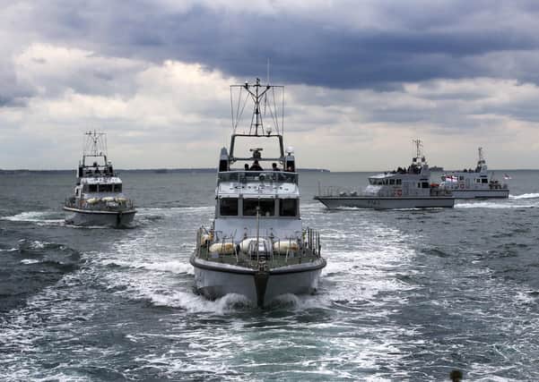 Four Archer Class P2000 Patrol Boats together at sea.