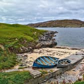 Harris is described as a ‘land of rugged rocks and mountains, scattered with purple heather and deep blue lochs’.