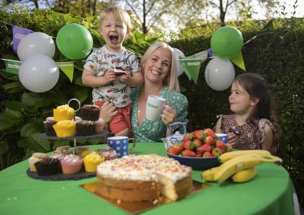 Author and tv presenter Cat Cubie and her kids Roar (3) and Indy (5) take advantage of a rare afternoon of sunshine to enjoy an outdoor coffee morning in aid of Macmillan Cancer Support. Photo: Wattie Cheung Photography