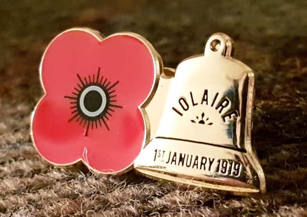 Buy your poppy pin by clicking on the sales link in the story.