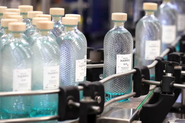 Gin bottles on the production line at the Isle of Harris Distillery in Tarbert. Andrew Milligan/PA Wire