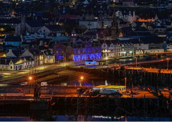 Stornoway Town hall lit up Blue for Burns Day 2021 - Scott Davidson