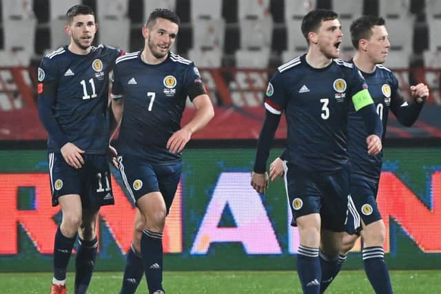 Ryan Christie (1st left) celebrates scoring in Serbia with team-mates John McGinn, Andy Robertson and Callum McGregor (Pic courtesy of Getty Images)