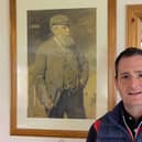 Gary Young in Askernish clubhouse with Old Tom Morris in background
