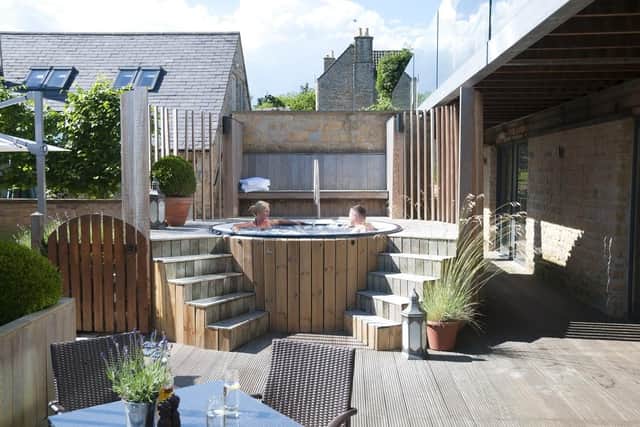 The bubbling hot tub by the pool is inviting. Image: Feversham Arms