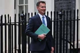 Britain's Chancellor of the Exchequer Jeremy Hunt leaves 11 Downing Street to present his Autumn Budget Statement at the House of Commons..(Photo by JUSTIN TALLIS/AFP via Getty Images)