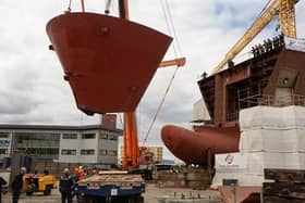 Work on the two new vessels continues, but there are still lingering concerns over even more delays and further additional costs.