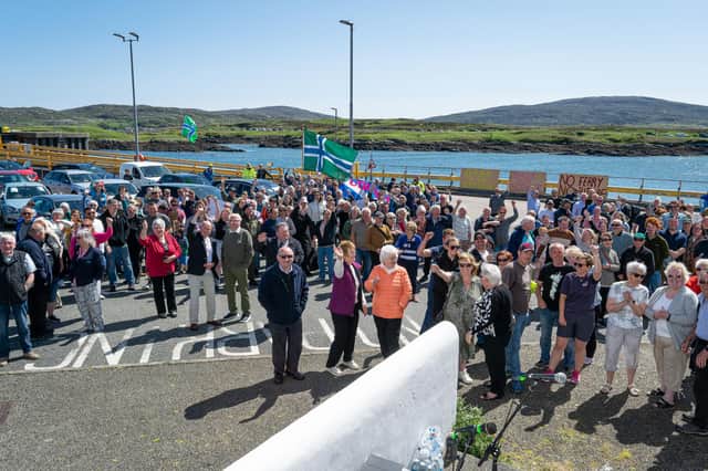 MAKING THEIR FEELINGS KNOWN: There was a huge community turnout to the protest in Lochboisdale last Sunday at the continuing failure of ferry services. (Pic: Seonaidh MacInnes)