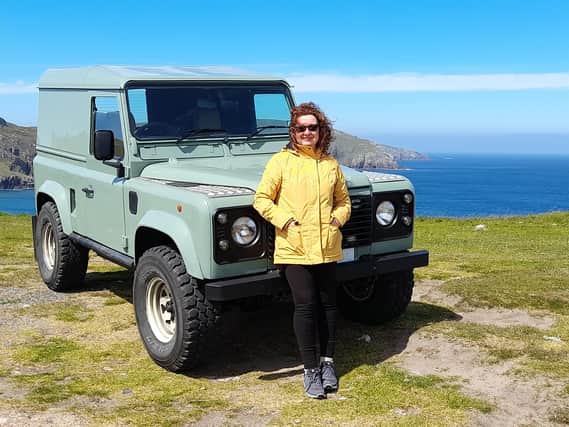Julie with her Land Rover Defender, which she took all the way from the Falklands