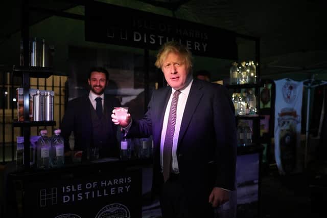 Boris enjoying his Harris Gin