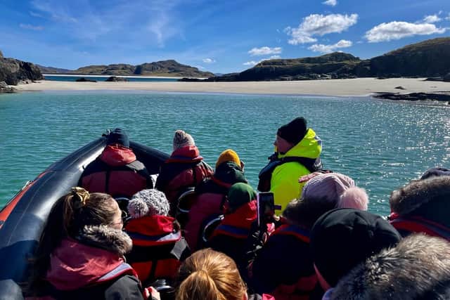 Taking passengers out on a RIB near Reef Beach in Uig.