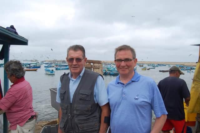 Colin MacInnes and Brian Wilson in the fishing port of Salinas