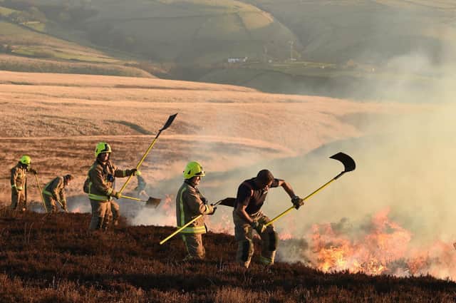Local fires crews play a vital role in, for example, tackling moorland fires, which are on the increase due to climate change. (Photo: Oli Scraff/Getty Images)