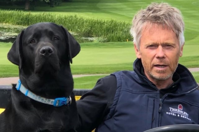 Angus and Alvin, his new black lab, on the famous course