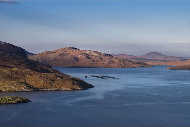 Salmon farms dot the seas and bays around the Western Isles.