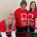 British Heart Foundation Lewis and Harris Fundraising Group members Janice Ann Anderson (far left ) and Laura Campbell (far right), with Murdo and daughter Karen.