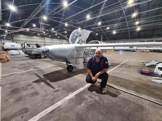 Israel Briggs in the Stornoway Airport hangar.