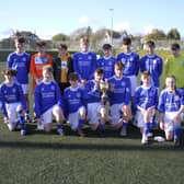Back U15s with the Kemnay Cup after the match