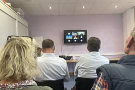 Members of the Ness community listen in to Monday's proceedings