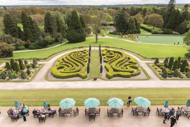 A view of Nidd Hall's terrace and ornate gardens.