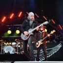 Damon Johnson and Keith Christopher of Lynyrd Skynyrd perform on stage in Nashville, Tennessee. (Photo by Jason Davis/Getty Images)