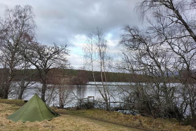Camping for the night beside a loch.