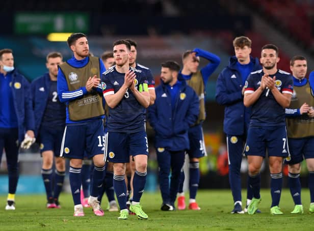 Andy Robertson of Scotland applauds the fans with team-mates following defeat to Croatia on Tuesday night (Pic by Stu Forster/Getty Images)