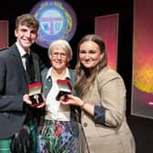 Maggie Cunningham with 2023 Mod Gold medallists Iain Cormack and Emma MacLeod