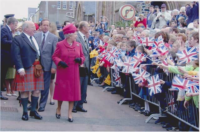 Large crowds lined the streets of the town as the Lord Lieutenant, Sandy Matheson, guided the royal couple on their informal walkabout.