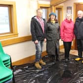 Committee members Nigel Buckley, Joanne Vincent, Chrissie MacAskill and Iain MacKillop. The tarpaulin on floor is protection against rain ingress.