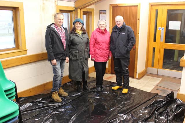Committee members Nigel Buckley, Joanne Vincent, Chrissie MacAskill and Iain MacKillop. The tarpaulin on floor is protection against rain ingress.