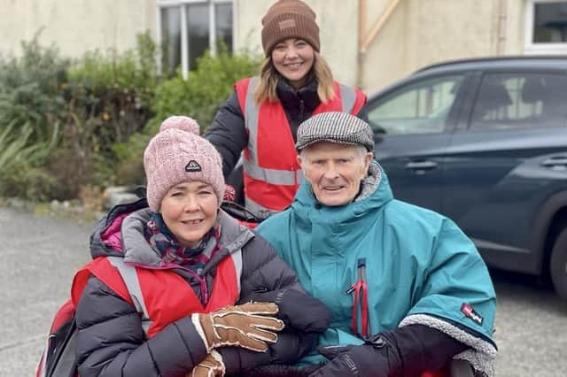 A Dun Berisay resident out and about, with befriender Jill Maclean and Ashley MacLeod
