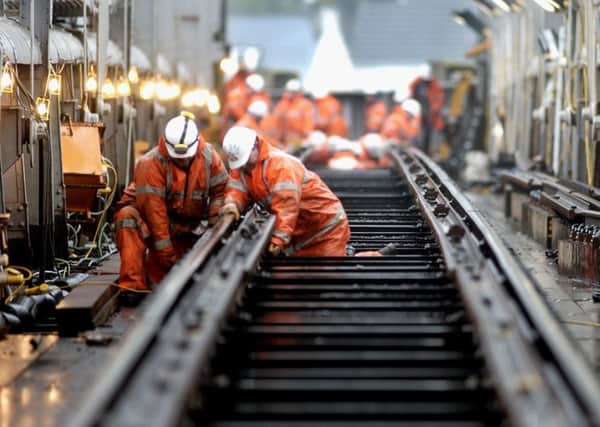 At work...Network Rail engineers have a busy weekend which may disrupt train services