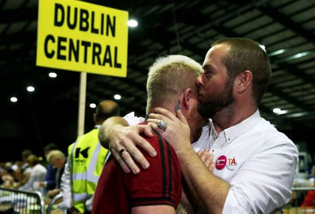 Jaime Nanci (left) and Michael Barron who were married in Cape Town five years ago pictured at the Dublin count. Picture: PA