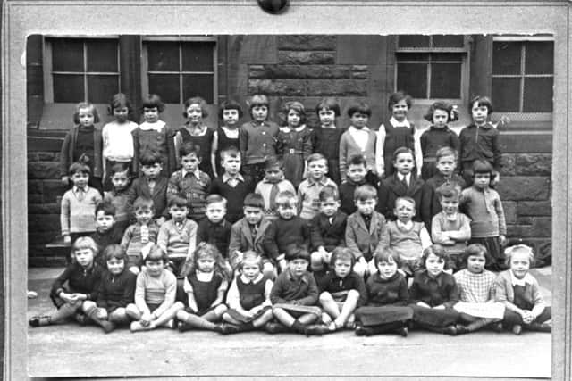A school photo with Sean third from right and three rows back