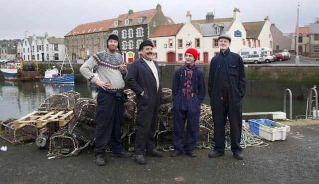 The cast of 'A Cinema in South Georgia' in Eyemouth harbour
