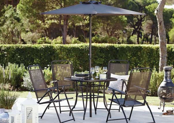 Oslo four-seater dining set and parasol, available from Dunelm. Photo: PA Photo/Handout.
