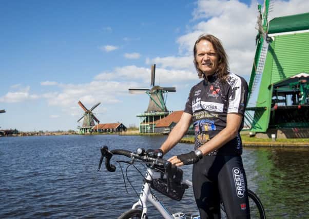 Dr Tertius Venter is pictured at his starting point in Amsterdam.