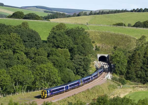 06/09/2015. Borders Railway service opens to the paying public connecting Edinburgh with the Scottish Borders. A northbound  train from Tweedbank enters the Bowshank tunnel north of Galashiels this morning. 


Â©Ian Rutherford 
ianrutherfordphotography@gmail.com
www.ianrutherfordphotography.com
07710337520