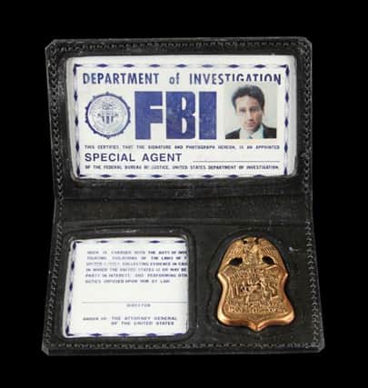 Do you believe... you could be the next owner of the  X Files' Fox Mulder's FBI badge?
