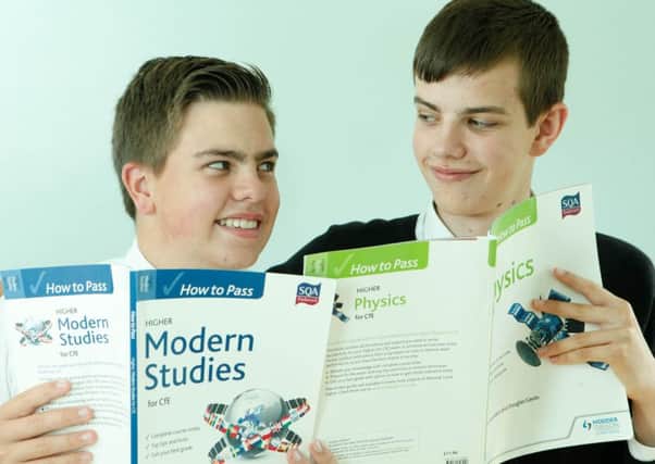 Picture Toby Williams 07920841392. Thomas and Adam, (jumper), Anderson. 16 year old twins who will recieve their exam results tommorow.
