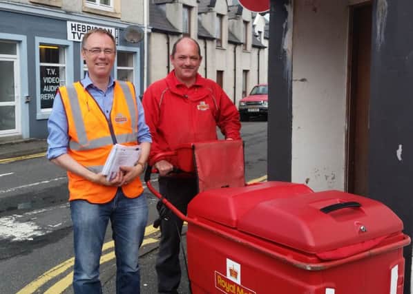 MSP Dr Alasdair Allan experienced what is involved in delivering the post when he joined local postie, John Macleod, on his delivery round in Stornoway.