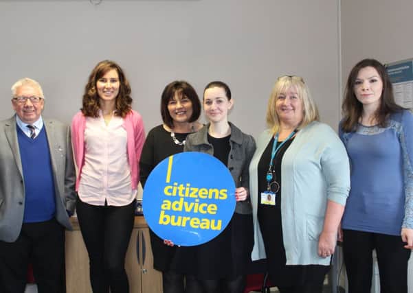 Jeanne Freeman, centre left, at the Lewis Citizens Advice with staff Roddy Nicolson, Hannah Knight, Marie-Clare Harold, Mary MacLean and Christine Yardley.