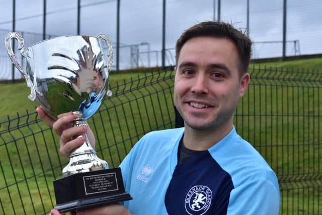 Winning captain Derek Wark, led his Glasgow Island AFC team to victory over a Lewis and Harris Select team in the 2016 Mod Football cup, sponsored by MG ALBAs learngaelic.scot. The game ended in a 2-2 draw before Glasgow won 3-1 on penalties.