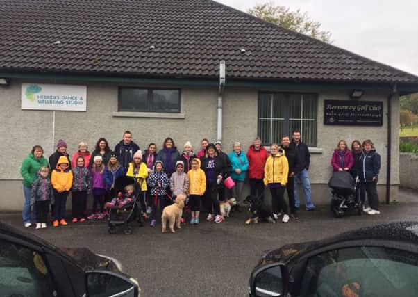 The walkers braved the weather to raise funds for this worthy cause.