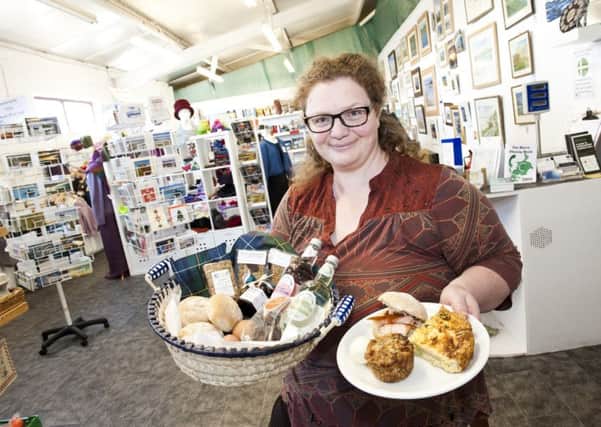 Sarah MacLean in the Buth shop. Pictured by the Outer Hebrides Tourism Industry Association.